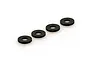 Four black circular steel washers arranged in a diagonal line against a white background.