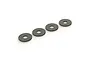 Four small, flat, circular steel washers arranged in a diagonal line against a white background.