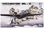 Box art for a Trumpeter 1/48 scale Wellington Mk. IC model kit showing a bomber aircraft on a snowy airfield with ground crew loading bombs.