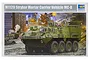 Box art for Trumpeter 1/35 scale M1129 Stryker Mortar Carrier plastic model kit showing an illustrated military vehicle in a battle scene.