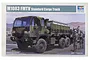Box art for Trumpeter 1/35 scale M1083 FMTV Standard Cargo Truck plastic model kit showing a camouflage military truck and two soldiers.