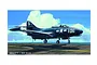 Box art illustration of a US Navy F9F-3 Panther jet on an aircraft carrier deck against a blue sky with clouds.
