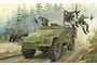 Box art illustration for a Trumpeter 1/35 scale BTR-40 model kit showing soldiers dismounting a green armoured vehicle in a forest setting.