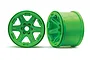 Two bright green Traxxas 3.8-inch RC monster truck rims shown from front and side angles against a white background.