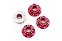 Four red aluminium flanged serrated nuts for RC cars, with one showing the serrated underside.