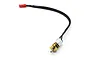 A small brushed DC motor with an attached brass gearbox and a black braided wire lead ending in a red JST connector.