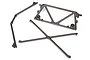 Traxxas UDR center rear tube chassis components in dark grey plastic, shown from an overhead angle on a white background.