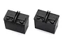 Two black plastic scale model car batteries for the Traxxas Unlimited Desert Racer.