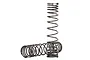 Two dark grey metal coil springs for Traxxas UDR RC vehicle suspension, one standing upright and one lying horizontally.