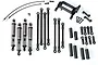 Traxxas Long Arm Lift Kit components including four shock absorbers, suspension links, a chassis mount, and various hardware on a white background.