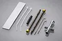Tamiya Grasshopper rod set including metal rods, zip ties, a rubber tube, and a cross wrench tool on a grey background.