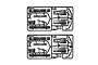 Two identical black plastic Tamiya RC axle housing sprues shown on a white background.