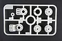 A Tamiya Parts Bag P grey plastic sprue containing various servo saver horn components on a dark background.