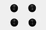 Four small black circular rubber shock cap seals arranged in a square pattern against a plain white background.