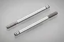 Two Tamiya metal shock shafts for RC cars, featuring threaded ends and grooved piston attachment points, shown against a light grey background.
