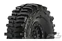 A close-up of a Pro-Line 1.9 inch Interco Bogger rock crawler tire mounted on a black Impulse internal bead-lock rim.