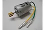 A silver RS-380 brushed RC motor with a brass pinion gear attached to the shaft and green and yellow wires with bullet connectors.