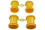 Four bright yellow plastic RC monster truck rims attached to two plastic sprues against a white background.