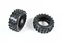 Two black Tamiya Hotshot RC buggy rear tyres with a knobby tread pattern on a white background.