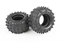 Two black Tamiya RC buggy rear tyres with a knobby spike tread pattern, shown against a white background.