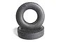 Two black Tamiya 1/14 scale RC truck front tyres stacked on a white background.