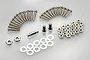 A collection of silver-coloured metal RC hardware including various screws, nuts, washers, and a small metal pin arranged on a white background.