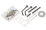Tamiya Frog RC spare parts bag containing various metal rods, plastic connectors, springs, and hardware components on a white background.