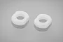 Two white plastic shock pistons for Tamiya RC cars shown against a neutral grey background.
