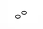 Two small, dark grey metal gudgeon pin washers isolated on a white background.
