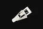 A white Tamiya Grasshopper RC car body shell viewed from an elevated angle against a black background.