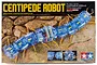Tamiya Centipede Robot Kit packaging showing a blue translucent robotic centipede on a rocky background.