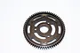 A dark grey steel spur gear with 64 teeth, featuring a cut-out design and the text 64T engraved on the face, isolated on a white background.