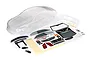 Unpainted clear polycarbonate Traxxas Cadillac CTS-V RC car body shell with included decal sheet, rear wing, and plastic accessories.