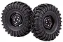 Two black 1.9-inch RC crawler wheels with aggressive off-road tread patterns, shown against a white background.