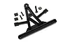 Traxxas TRX-4 spare tyre mount assembly including black plastic mount, screws, lock nut, and foam adhesive pads on a white background.