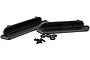 Two black plastic RC rock sliders with mounting hardware including screws and washers on a white background.
