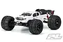 Pro-Line Brute Bash Armor body shell in white, pre-cut and mounted on an ARRMA Kraton 1/8 scale RC truck chassis against a white background.