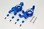 A pair of blue anodized aluminium steering blocks for an RC car, including small screws, spacers, and pins on a white background.