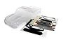 A clear, unpainted Traxxas TRX-4 Sport RC truck body shell shown next to a sheet of pre-cut decals on a white background.