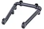 A black plastic U-shaped rear bumper mount for an RC vehicle, featuring mounting points and screw holes.