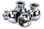 A close-up view of three shiny, silver-coloured metal suspension ball studs for RC vehicles.