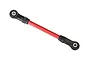 A red Traxxas TRX-4 steel suspension link with black plastic rod ends on a white background.