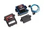 Traxxas TQi GPS Speed Telemetry Module 2.0 and Telemetry Expander 2.0 components with wiring harness on white background.
