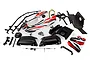 Rovan Baja 5B Shorty Q conversion kit components including a painted body shell, black roll cage parts, chassis plate, and hardware on a white background.