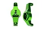 Two green anodized aluminium portal drive caster blocks for Traxxas TRX-4 RC cars, shown from front and side angles.