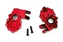 Two red anodized aluminium portal drive housings for Traxxas TRX-4 with two black mounting screws on a white background.