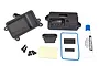 Traxxas Rustler 4X4 receiver box set including black plastic housing parts, screws, blue O-ring, foam pads, and a tube of silicone grease.