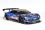 A 1/10 scale Tamiya Subaru BRZ R&D Sport 2014 RC car on a white background, featuring a blue racing livery with sponsor decals and black wheels.