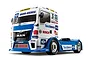 A studio shot of a Tamiya Team Hahn Racing MAN TGS RC touring truck model, featuring a white and blue livery with various sponsor decals.