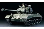A 1/16 scale Tamiya U.S. M26 Pershing RC tank model, painted olive drab with a white star, featuring a tank commander figure in the open hatch.